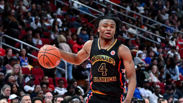 Mar 28, 2023; Houston, TX, USA; McDonald's All American West guard Isaiah Collier (4) dribbles the ball during the first half against the McDonald's All American East at Toyota Center. Mandatory Credit: Maria Lysaker-USA TODAY Sport
